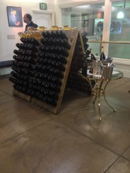 They used to store their wine in these kinds of racks in order to get the remaining yeast to the top of the bottle where they would then freeze the top and pull out the chunk of yeast.  