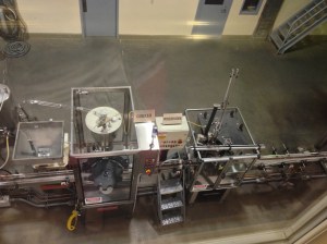 This is where they cork and foil the bottles to make them all look so pretty.